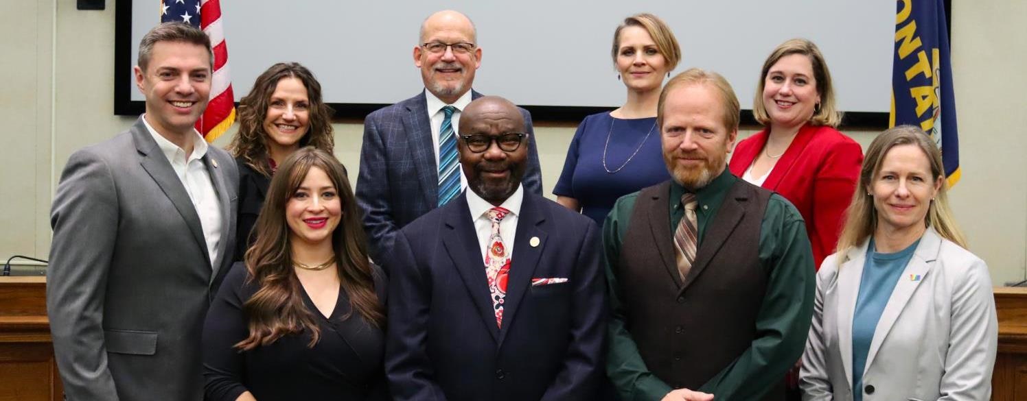 Elected City officials standing with City staff.