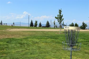 Volleyball court and disc golf cage at Mountain View Park.