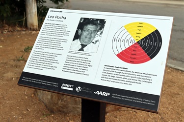 Educational sign about Leo Pocha.