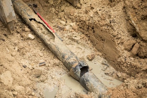 broken old water pipe underground