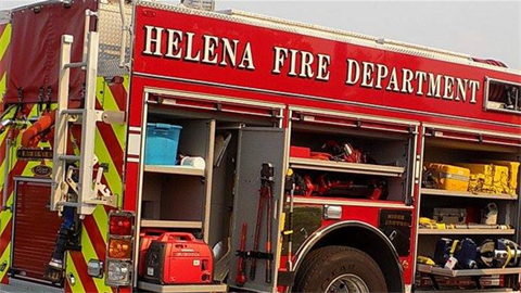 City of Helena Fire Truck with its equipment doors open.